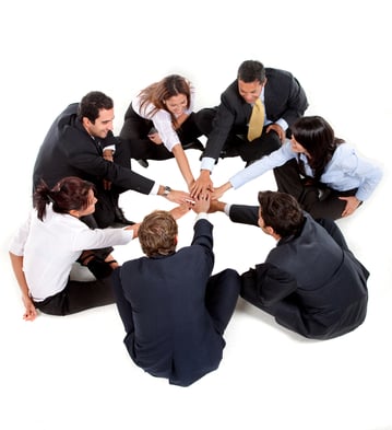 business team with their hands together isolated