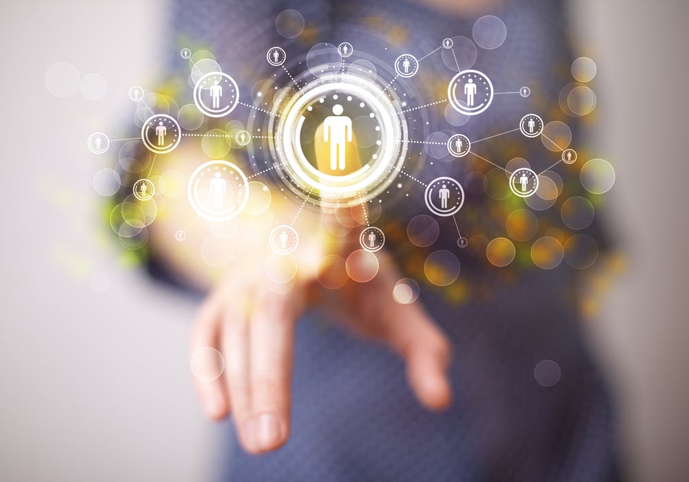 Young woman touching future technology social network button-1